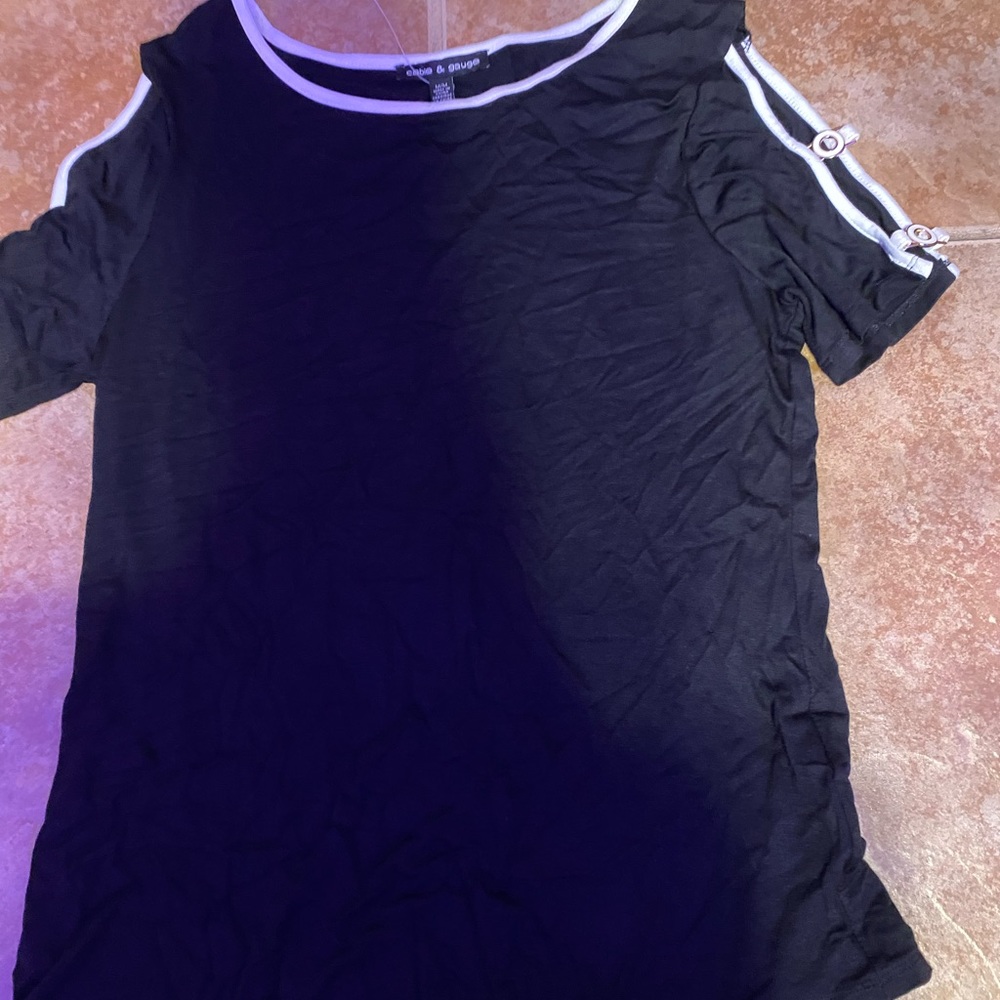 Black womens blouse with white outlined cutouts